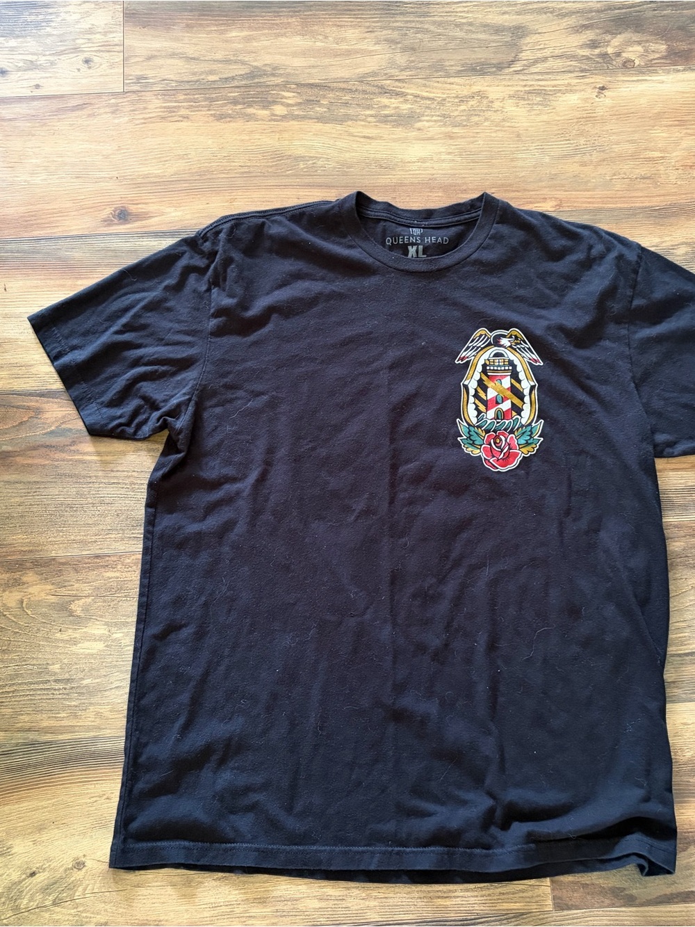 Black Short Sleeve Tee with Crest Graphic